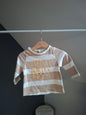 T-shirt rayé beige et blanc