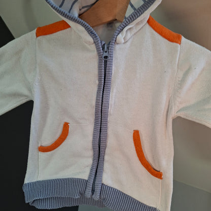 Gilet blanc et orange