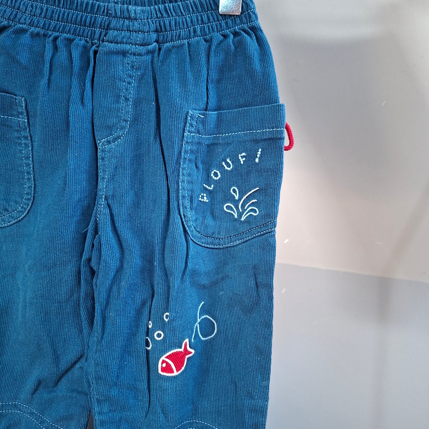 Pantalon "poisson rouge"