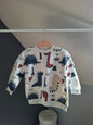 Pull gris dinosaures