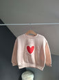 Pull rose cœur