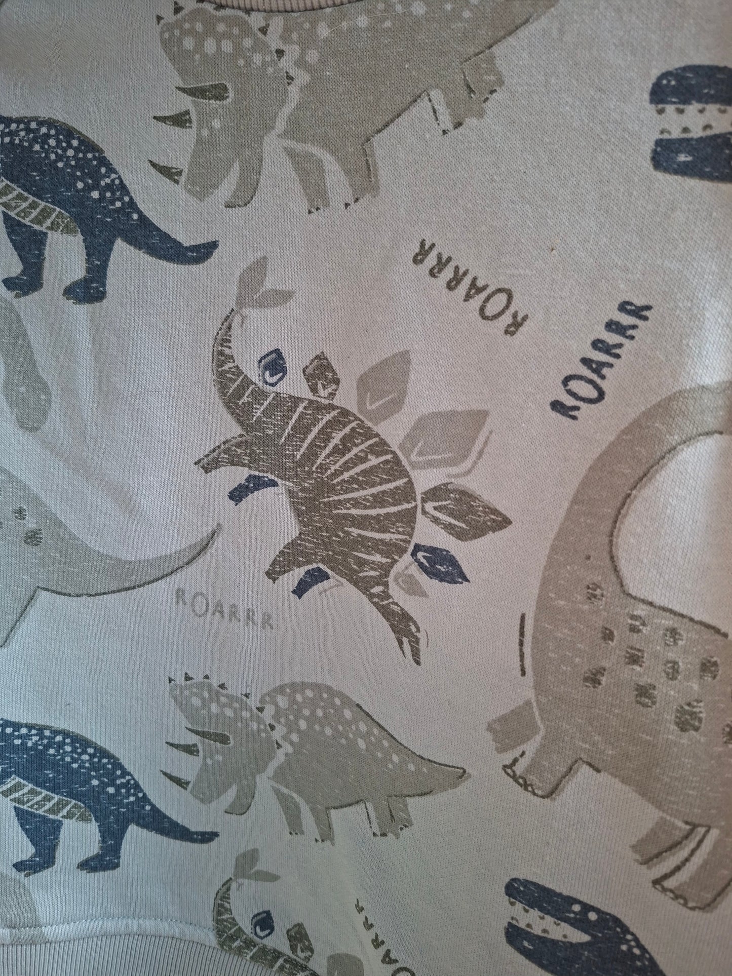 Pull bleu dinosaures