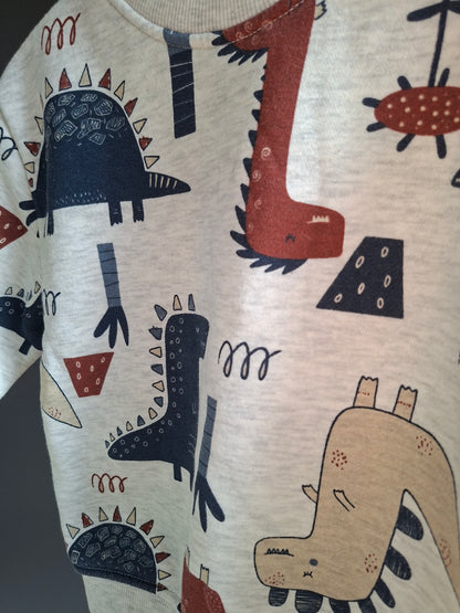 Pull gris dinosaures