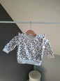 Pull blanc fleuris