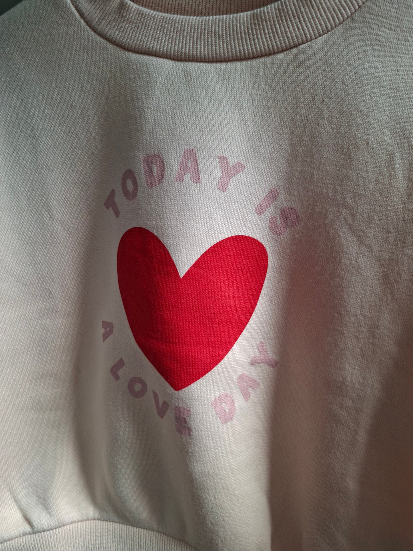 Pull rose cœur