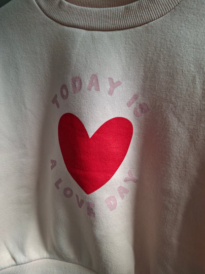 Pull rose cœur